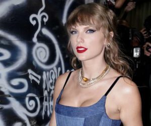 Taylor Swift steps out in denim dress to celebrate VMAs success