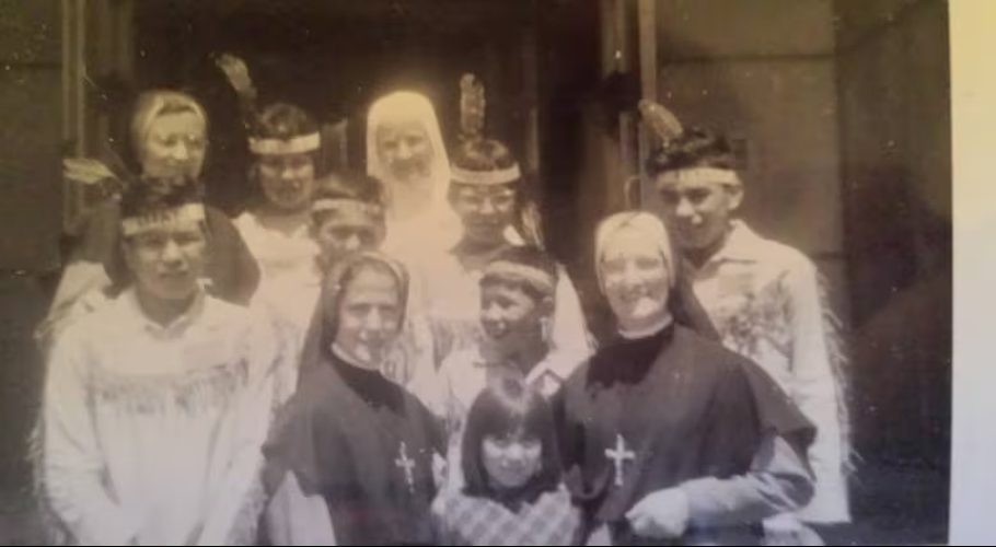 Evelyn Korkmaz, front and centre, with Sister Francoise Seguin, right, at St. Anne’s in Fort Albany before leaving for Expo 67 in Montreal. (Submitted by Evelyn Korkmaz)