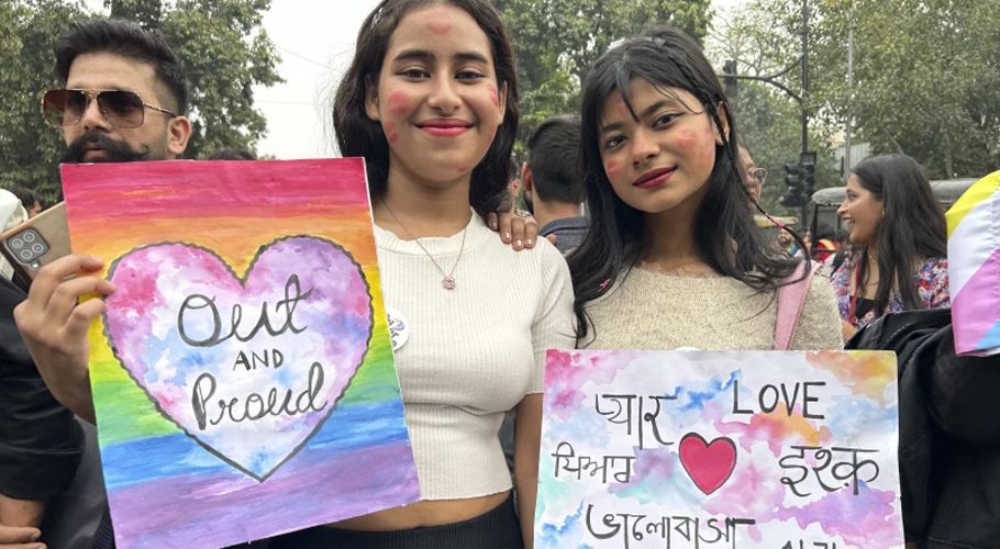 Participants of the Delhi Queer Pride Parade carrying placards saying ‘Out and Proud’ and ‘Love’ pose for a photograph during the march in New Delhi, India, Sunday, Nov. 26, 2023. This annual event comes as India’s top court refused to legalize same-sex marriages in an October ruling that disappointed campaigners for LGBTQ+ rights in the world’s most populous country. (AP Photo/Shonal Ganguly)