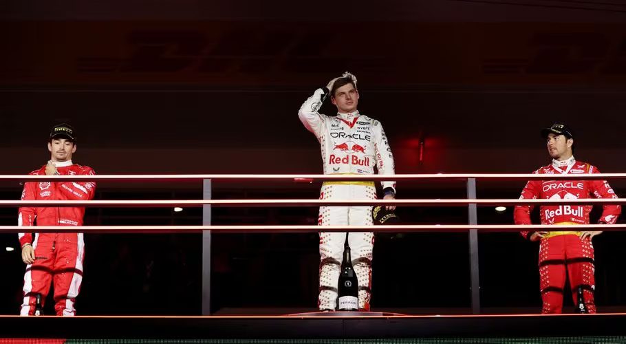 ormula One F1 - Las Vegas Grand Prix - Las Vegas Strip Circuit, Las Vegas, Nevada, U.S - November 18, 2023 First place Red Bull's Max Verstappen celebrates on the podium with second place Ferrari's Charles Leclerc and third place Red Bull's Sergio Perez REUTERS/Mike Blake Acquire Licensing Rights