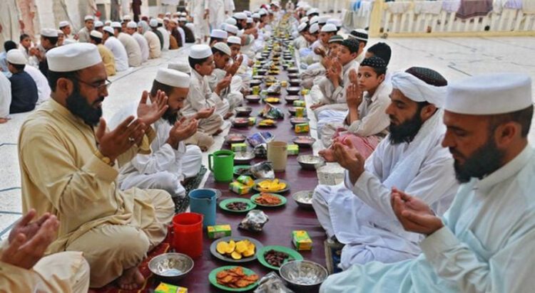 FILE Pakistani Muslims pray before breaking their fast at a mosque during the first day of Ramadan in Peshawar, Pakistan, on July 11, 2013. — AFP