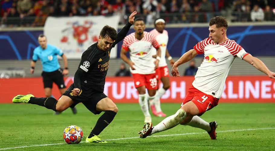 Football - Champions League - Round of 16 - First Leg - RB Leipzig v Real Madrid - Red Bull Arena, Leipzig, Germany - February 13, 2024 Real Madrid's Brahim Diaz shoots at goal REUTERS/Lisi Niesner