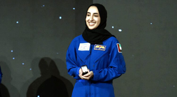 Nora AlMatrooshi, a NASA Artemis astronaut candidate graduate, smiles during a ceremony at Johnson Space Center in Houston, Texas, on March 5, 2024.(AFP)