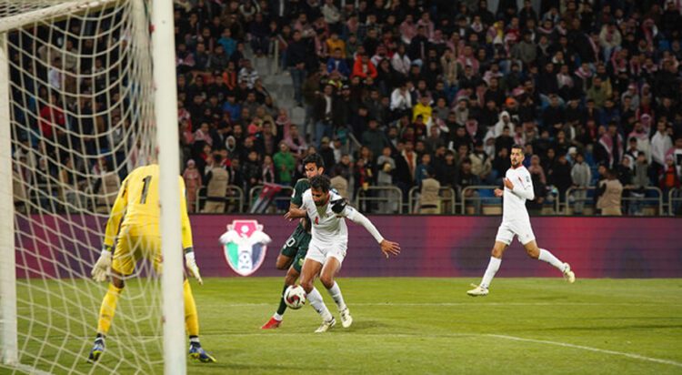 Pakistani and Jordanian players fight for the ball during the 2026 FIFA World Cup qualifier football match between Pakistan and Jordan at the Amman International Stadium in Amman on March 27, 2024. (Photo courtesy: PFF)