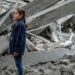 Palestinian children look at the rubble of a building destroyed in an Israeli strike on Gaza City. Photo: AFP