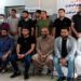 Faisal Edhi (c), the head of the iconic Edhi Foundation in Pakistan, gestures for a group photo with Palestinian students from Gaza, who are currently enrolled in various local educational institutions, in Karachi on March 30, 2024. (Photo courtesy: Edhi Foundation)