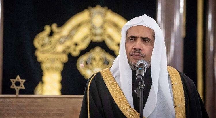 Secretary General of the Muslim World League Dr. Mohammad Abdulkarim al-Issa gives a speech during a visit to the Nozyk Synagogue on January 24, 2020 in Warsaw.AFP / Wojtek Radwanski