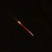 Objects are seen in the sky above Jerusalem after Iran launched drones and missiles towards Israel, in Jerusalem April 14, 2024. REUTERS/Ronen Zvulun Purchase Licensing Rights,