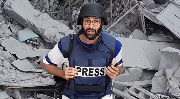 Journalist and activist Moataz Azaiza