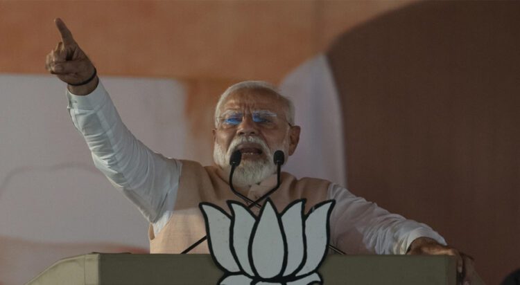 Indian Prime Minister Narendra Modi speaks at an election campaign rally in Meerut, India, Sunday, March 31, 2024. (AP Photo/Altaf Qadri)