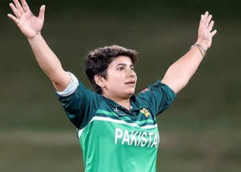 Nida Dar celebrates after taking a wicket. - AFP