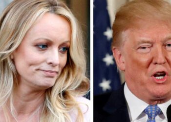 A combination photo shows adult film actress Stephanie Clifford, also known as Stormy Daniels speaking in New York City, and then- U.S. President Donald Trump speaking in Washington, Michigan, U.S. on April 16, 2018 and April 28, 2018 respectively. . REUTERS/Brendan McDermid (L) REUTERS/Joshua Roberts/File Photo