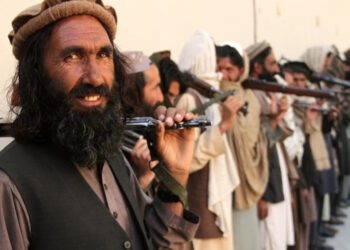 Taliban fighters in eastern Nangarhar Province attend a surrender ceremony in 2016. Rahman Safi/Xinhua via Getty Images