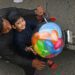 A boy carries a balloon on a motorbike after offering Eid al-Fitr prayers, marking the end of the holy fasting month of Ramadan, in Karachi on April 10, 2024. (AFP)
