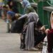 Afghan people wait outside the Australian embassy in New Delhi on August 19, 2021 after submitting documents to apply for a visa. (AFP/File)