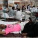 Patients of heatstroke receive treatment at a hospital in Karachi on May 23, 2024. (AP)