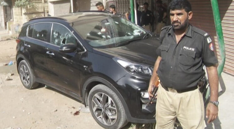 A photograph of the targeted, bullet-ridden car. (Image: Express Tribune)