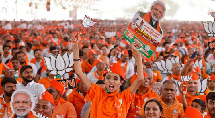 Supporters of prime minister Narendra Modi during an election campaign rally in Anand, Gujarat (Reuters)