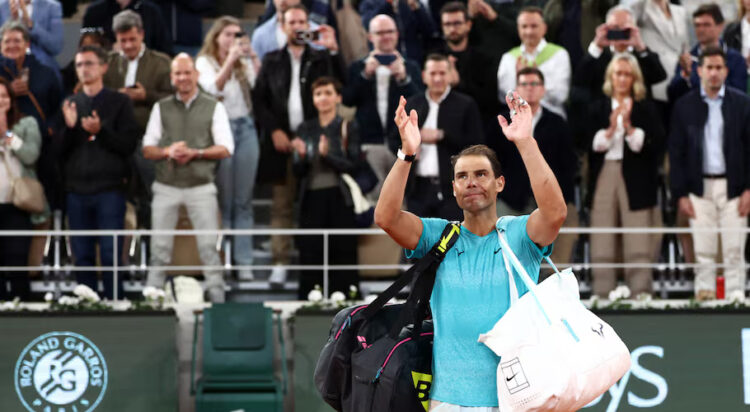 Tennis - French Open - Roland Garros, Paris, France - May 27, 2024 Spain's Rafael Nadal waves to the crowd as he leaves the court after losing his first round match against Germany's Alexander Zverev REUTERS/Yves Herman