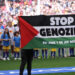 A 'Stop Genocide' banner is presented alongside the players ahead of the UEFA WCL final  (Image: raddit)