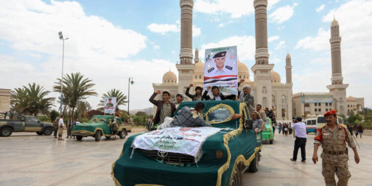 Yemenis transport the coffin of a casualty of recent strikes by US and British forces in the Huthi-run capital Sanaa on June 3, 2024. © Mohammed Huwais, AFP