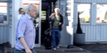 This screen shot courtesy of Wikileaks X page shows Wikileaks founder Julian Assange walking to board a plane from London Stansted Airport on June 24, 2024. — AFP