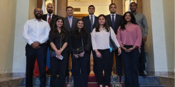 Pakistani rowing team members with their coach and manager as well as Pakistani Ambassador to Russia Muhammad Khalid Jamali.