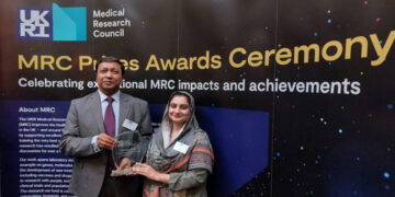Prof Dr M Iqbal Choudhary (left) and Prof Dr Sammer Yousuf gesture for a photo after they receive “Outstanding Team Impact Prize” from UK’s Medical Research Council. (APP) June 30, 2024