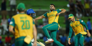 Cricket - T20 World Cup - Semi Final - South Africa v Afghanistan - Brian Lara Stadium, Tarouba, Trinidad and Tobago - June 26, 2024 South Africa's Tabraiz Shamsi celebrates with teammates the wicket of Afghanistan's Naveen-ul-Haq REUTERS/Ash Alle