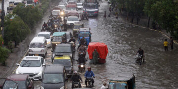 file photo of monsoon rain, urban flood in Karachi