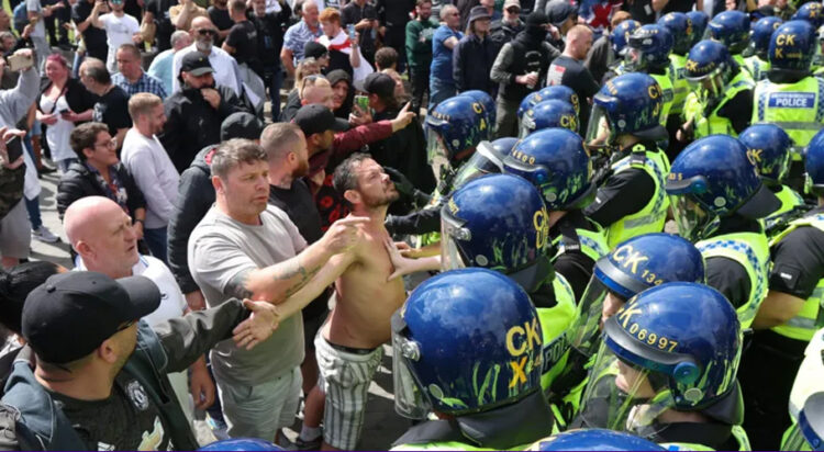 Police officers in Manchester worked to keep groups of demonstrators apart (Image: Shutterstock)