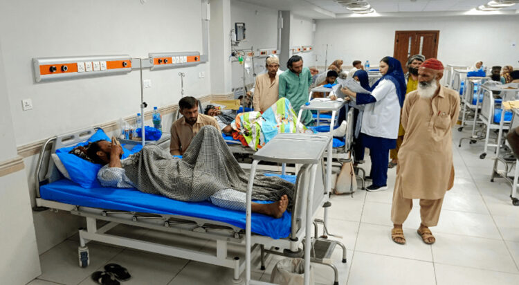 Wounded policemen rest at a hospital, after an attack in Punjab’s Rahim Yar Khan, on Aug 23, 2024. — AFP