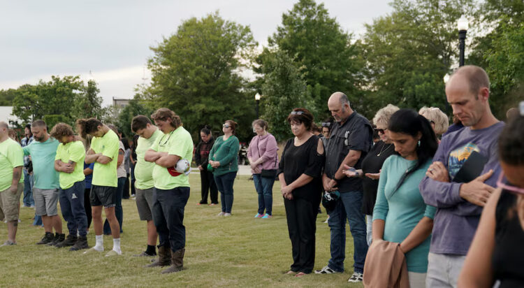 People attend a vigil at Jug Tavern Park following a shooting at Apalachee High School in Winder, Georgia, U.S. September 4, 2024. REUTERS/Elijah Nouvelage