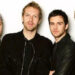 Coldplay has mesmerized audiences with their dynamic live shows and impressive discography, featuring Chris Martin (vocals, piano), Jonny Buckland (guitar), Guy Berryman (bass), Will Champion (drums, percussion), and Phil Harvey (manager). (Image: jagranjosh.com)