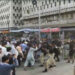 Police on Sunday clashed with protesters outside the Karachi Press Club (KPC) for violating Section 144. (Image. Dawn.com)