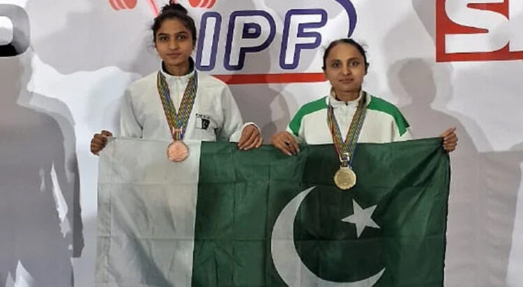 Sybil and Veronika rejoicing after winning the Commonwealth Powerlifting Championship. (Image: Sohail Imran via Geo News)