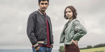 Zain Iqbal as Ravi Singh and Emma Myers as Pip Fitz-Amobi in A Good Girl's Guide to Murder. Sally Mais/Netflix