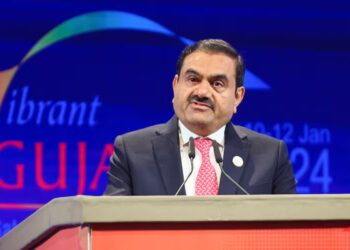 Chairperson of Adani Group Gautam Adani speaks during the Vibrant Gujarat Global Summit, at the Mahatma Mandir in Gandhinagar, Gujarat, India January 10, 2024. REUTERS/Amit Dave/File Photo