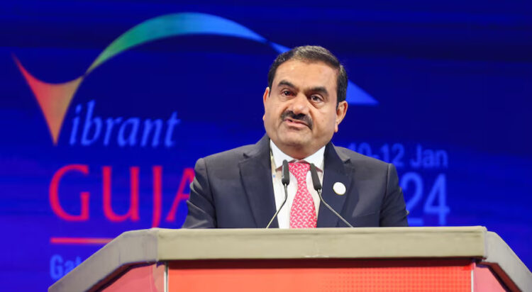 Chairperson of Adani Group Gautam Adani speaks during the Vibrant Gujarat Global Summit, at the Mahatma Mandir in Gandhinagar, Gujarat, India January 10, 2024. REUTERS/Amit Dave/File Photo