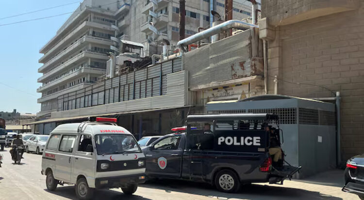 A view of police mobile and an ambulance outside a factory where according to police, two Chinese nationals were shot at and injured, in Karachi, Pakistan November 5, 2024. REUTERS/Akhtar Soomro