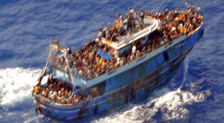 A undated handout photo provided by the Hellenic Coast Guard shows migrants onboard a boat during a rescue operation, before their boat capsized on the open sea, off Greece, June 14, 2023. Hellenic Coast Guard/Handout via REUTERS