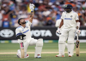 India all-rounder Nitish Kumar Reddy celebrates scoring a hundred against Australia on day three of the Boxing Day Test at the MCG in Melbourne. Photograph: Martin Keep/AFP/Getty Images