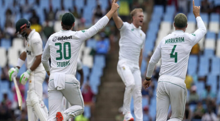 South Africa's players celebrate after teammate Corbin Bosch took a wicket during third International cricket match between South Africa and Pakistan, at the Wanderers stadium in Johannesburg, South Africa, Thursday, Dec. 26, 2024. (AP Photo/Themba Hadebe)ASSOCIATED PRESS