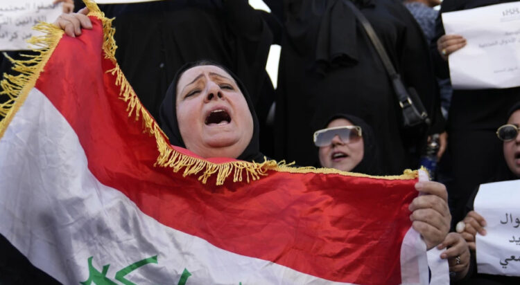 Protesters gather to demonstrate against a proposed law to permit underage female marriage in Tahrir Square in Baghdad, Iraq, Aug. 8, 2024. (AP Photo/Hadi Mizban, File)