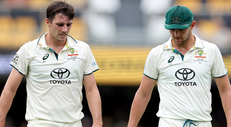 This file photos shows Australia's Pat Cummins (L) and Josh Hazlewood (R) during day two of the second cricket Test match between Australia and West Indies at the Gabba in Brisbane on January 26, 2024. (AFP/File)