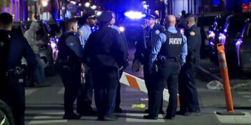 Police officers stand at the scene where a truck drove into a large crowd on Bourbon Street in the French Quarter of New Orleans, Louisiana, U.S. January 1, 2025 in this screengrab taken from a video. ABC Affiliate WGNO/Handout via REUTERS