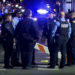 Police officers stand at the scene where a truck drove into a large crowd on Bourbon Street in the French Quarter of New Orleans, Louisiana, U.S. January 1, 2025 in this screengrab taken from a video. ABC Affiliate WGNO/Handout via REUTERS