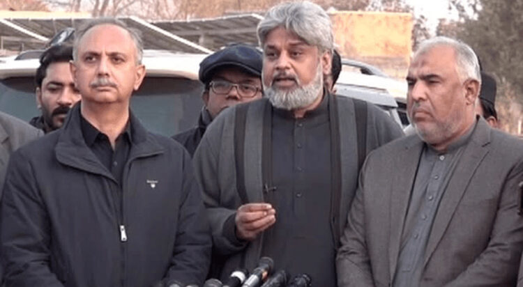 Sunni Ittehad Council Chairman Sahibzada Hamid Raza, PTI’s Omar Ayub Khan and Asad Qaiser, addresses reporters outside Adiala Jail in Rawalpindi on January 12. — (Credit; DawnNews TV)