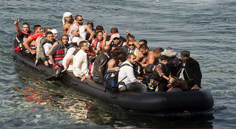 Refugees arrive on the shore of Sykamias beach, west of the port city of Mytilini, after crossing the Aegean sea from Turkey in Lesvos Island, Greece. Credit: Photo: File/AFP/Getty