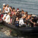 Refugees arrive on the shore of Sykamias beach, west of the port city of Mytilini, after crossing the Aegean sea from Turkey in Lesvos Island, Greece. Credit: Photo: File/AFP/Getty